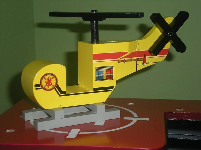 Toy helicopter on top of a deskl